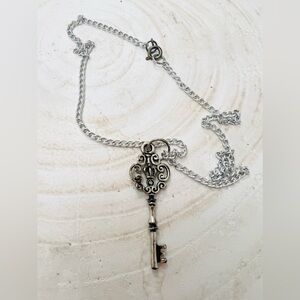 Silver key pendant